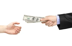 depositphotos_45891057-stock-photo-hand-handing-money-to-another