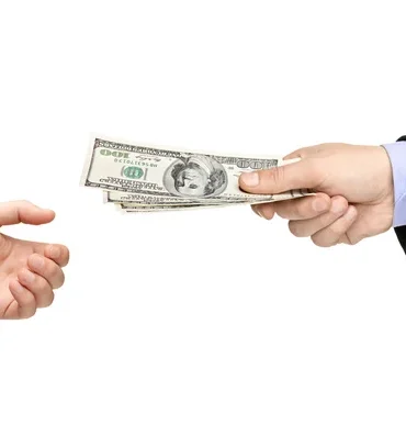 depositphotos_45891057-stock-photo-hand-handing-money-to-another