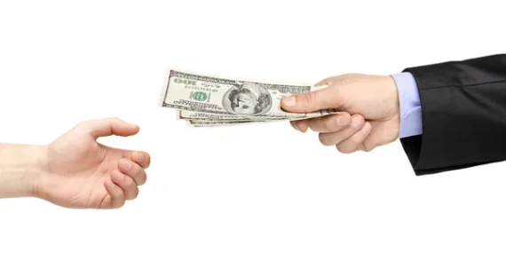 depositphotos_45891057-stock-photo-hand-handing-money-to-another