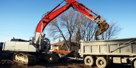 Mechanical digger and truck